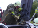 Übung: VU mit eingeklemmter Person + Autobrand